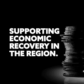 An image of text stating supporting economic recovery in the region.